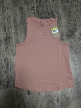 Nike Women's Dusty Pink Athletic Tank Top with White Swoosh